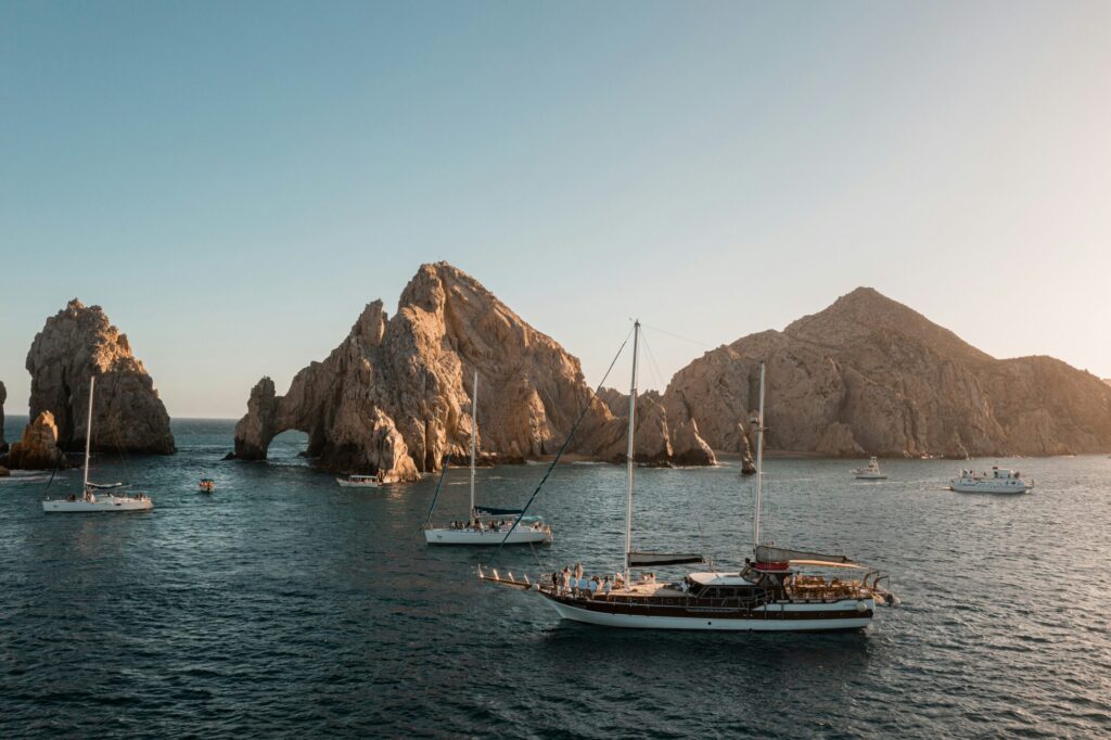 a group of boat floating on top of body water